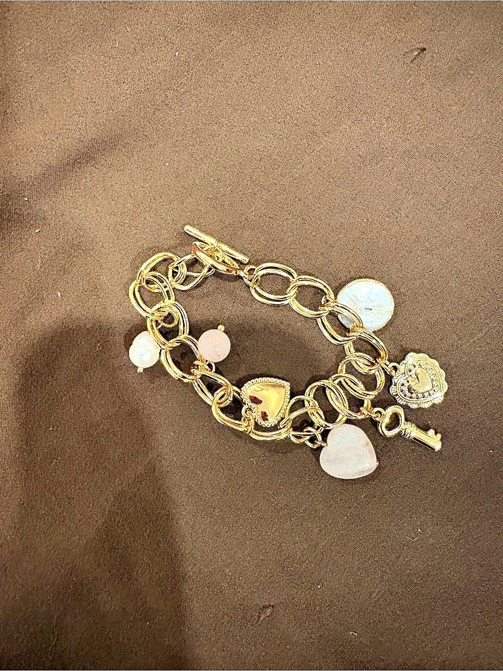 Charm Bracelet in Gold & White Like New